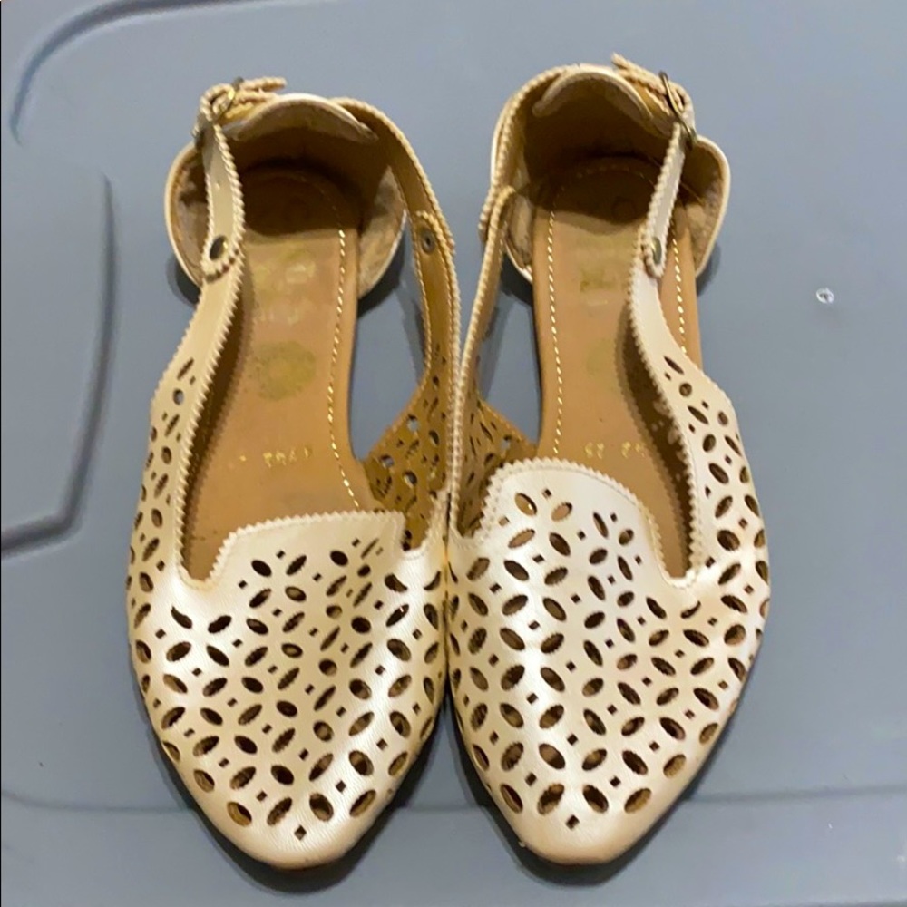 Golden flat shoes